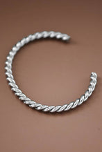 Load image into Gallery viewer, Silver cuff bracelet with a twisted cable