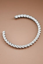 Load image into Gallery viewer, Silver cuff bracelet with a twisted cable
