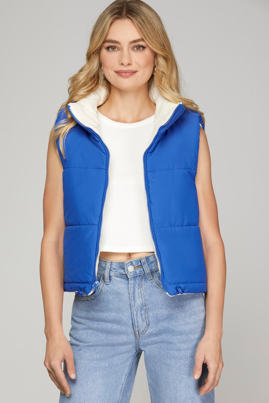 REVERSIBLE ZIP UP DRAWSTRING PUFFER VEST WITH SIDE POCKETS