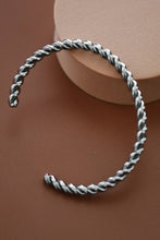 Load image into Gallery viewer, Silver cuff bracelet with a twisted cable
