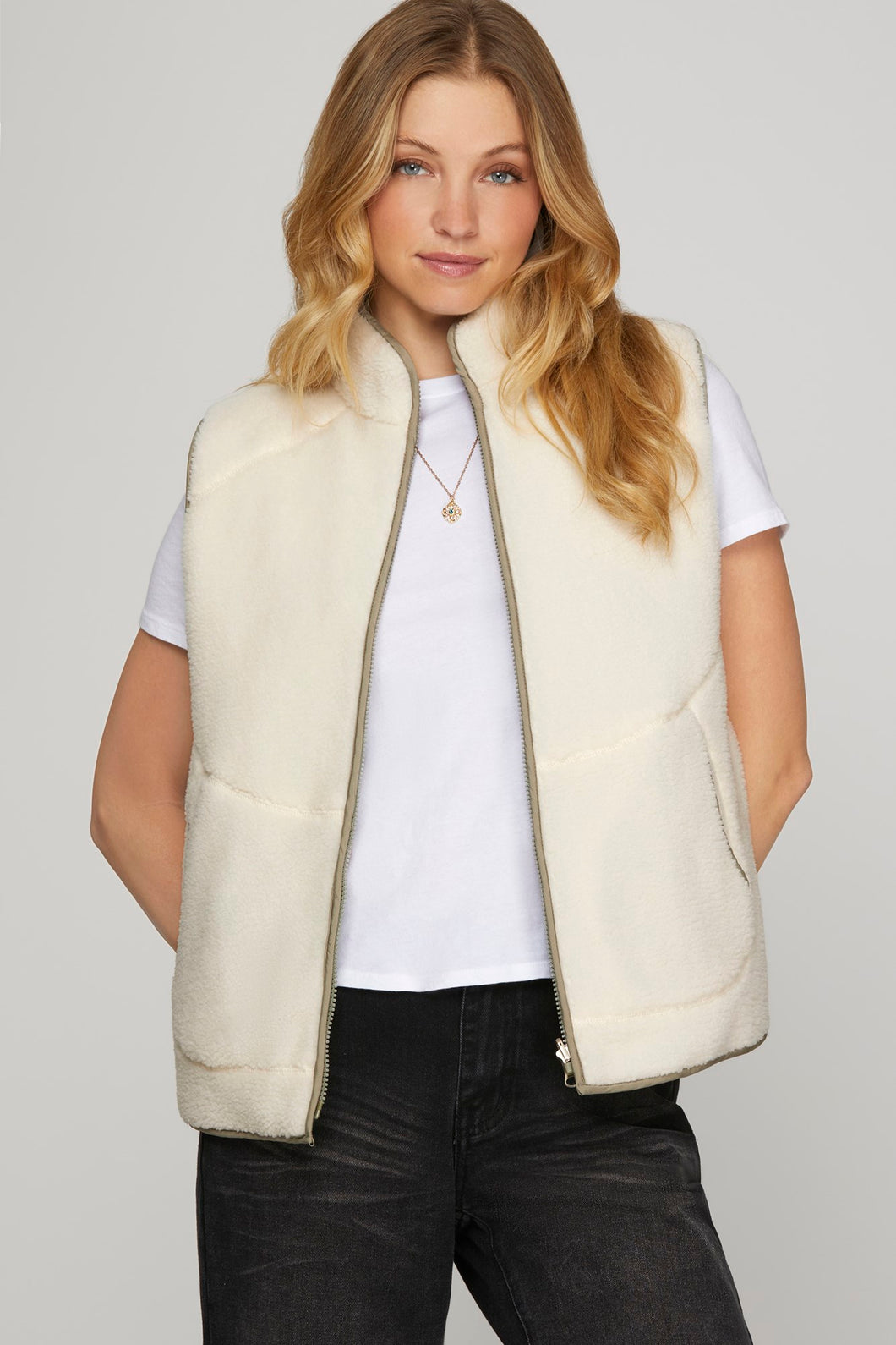 REVERSIBLE FLEECE AND QUILTED VEST