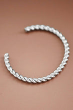 Load image into Gallery viewer, Silver cuff bracelet with a twisted cable

