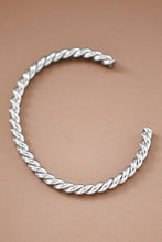 Load image into Gallery viewer, Silver cuff bracelet with a twisted cable
